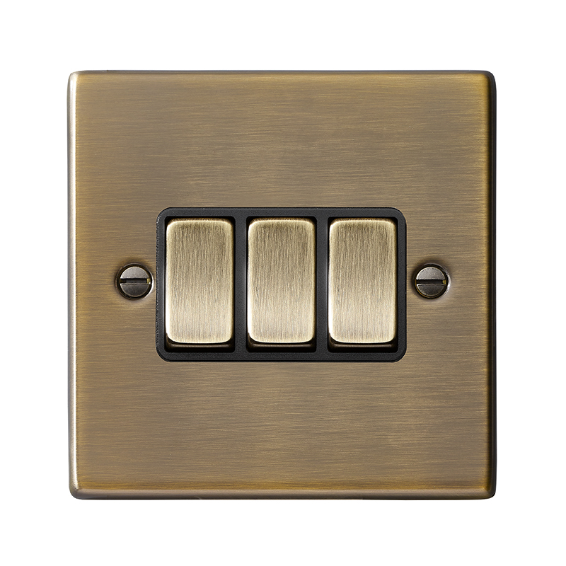 Hamilton 79R23AB-B Hartland Antique Brass 3 Gang 10AX 2 Way Switch with Antique Brass Rocker and Black Surround