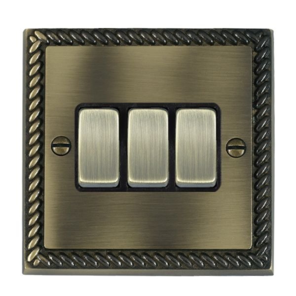 Hamilton 91R23AB-B Cheriton Georgian Antique Brass 3 Gang 10AX 2 Way Switch with Antique Brass Rockers and Black Surround