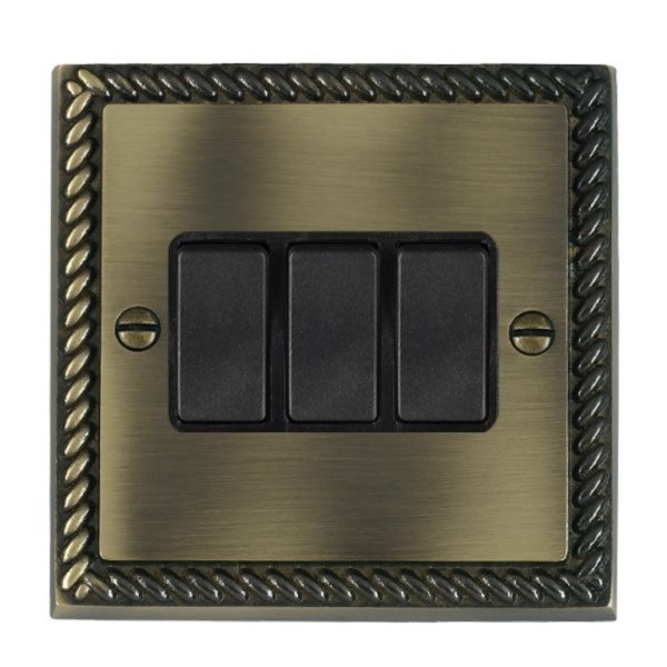 Hamilton 91R23BL-B Cheriton Georgian Antique Brass 3 Gang 10AX 2 Way Switch with Black Rockers and Black Surround