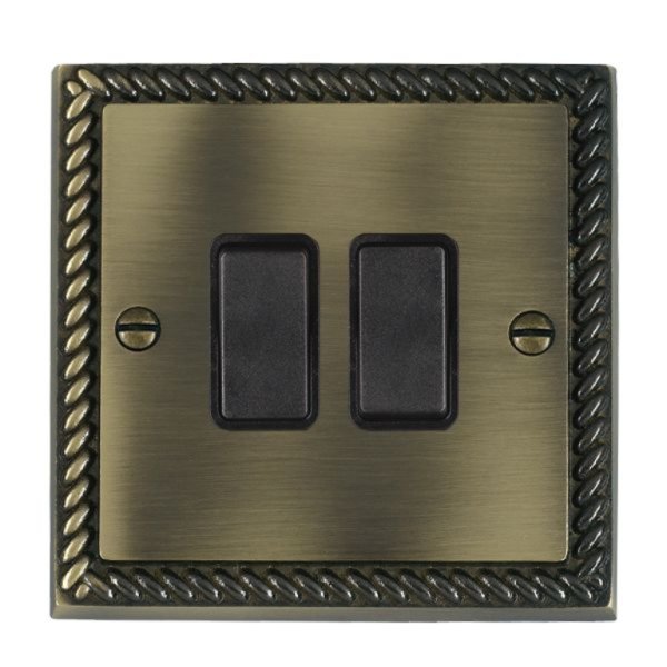 Hamilton 91R32BL-B Cheriton Georgian Antique Brass 2 Gang 10AX Intermediate Switch with Black Rockers and Black Surround