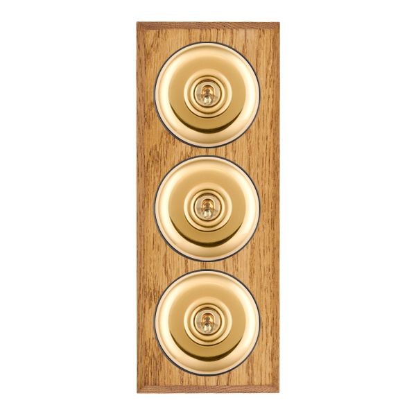 Hamilton BCMPT23PB-B Bloomsbury Chamfered Medium Oak 3 Gang 20AX 2 Way Toggle Switch with Polished Brass Plain Dome and Black Collar