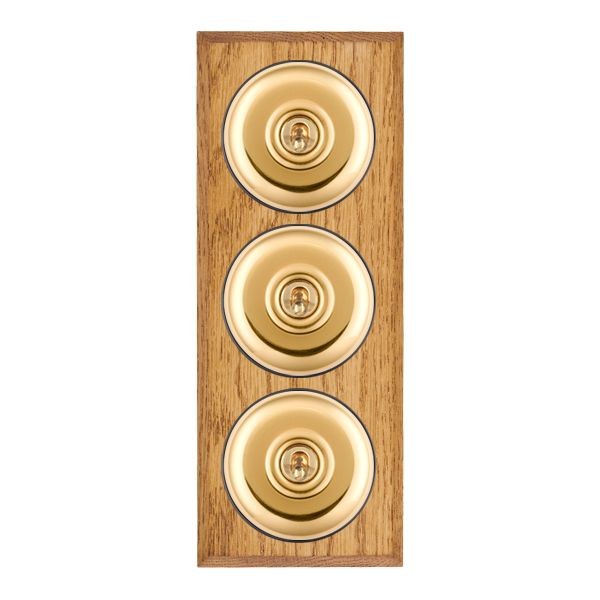 Hamilton BCMPT23PB-B Bloomsbury Chamfered Medium Oak 3 Gang 20AX 2 Way Toggle Switch with Polished Brass Plain Dome and Black Collar