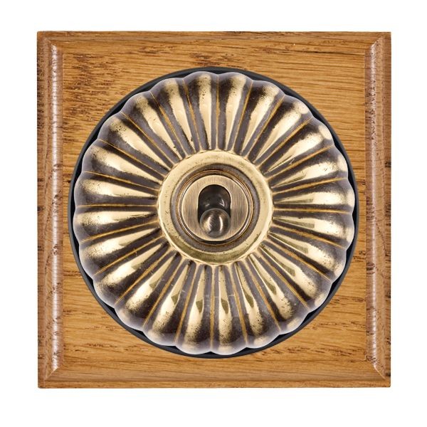 Hamilton BOMFT21AB-B Bloomsbury Ovolo Medium Oak 1 Gang 20AX 2 Way Toggle Switch with Antique Brass Fluted Dome and Black Collar