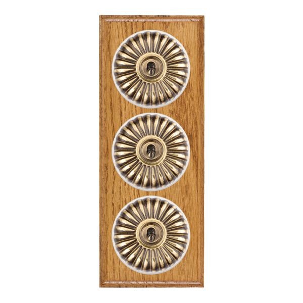 Hamilton BOMFT23AB-W Bloomsbury Ovolo Medium Oak 3 Gang 20AX 2 Way Toggle Switch with Antique Brass Fluted Dome and White Collar