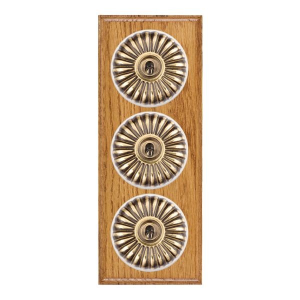 Hamilton BOMFT23AB-W Bloomsbury Ovolo Medium Oak 3 Gang 20AX 2 Way Toggle Switch with Antique Brass Fluted Dome and White Collar