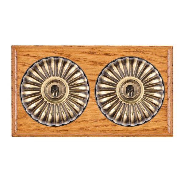 Hamilton BOMFT32AB-B Bloomsbury Ovolo Medium Oak 2 Gang 20AX Intermediate Toggle Switch with Antique Brass Fluted Dome and Black Collar