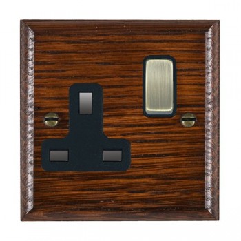 Hamilton Woods Ovolo Antique Mahogany 1 Gang 13A Double Pole Switched Socket with Antique Brass Rocker and Black Surround