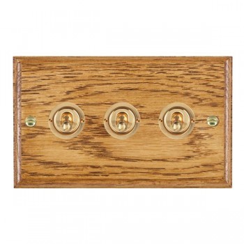 Hamilton Woods Ovolo Medium Oak 3 Gang 20AX 2 Way Toggle Switch with Polished Brass Toggles